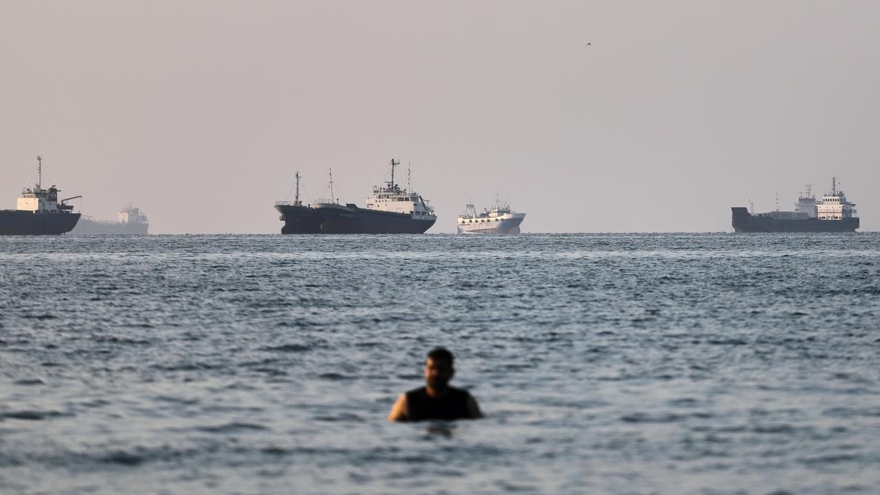 Ships are anchored in the Strait of Hormuz off Iran