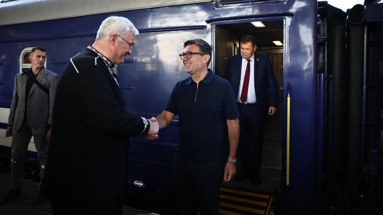 Ukraine's Andrii Sybiha greets UK Prime Minister Andy Burnham in Kyiv