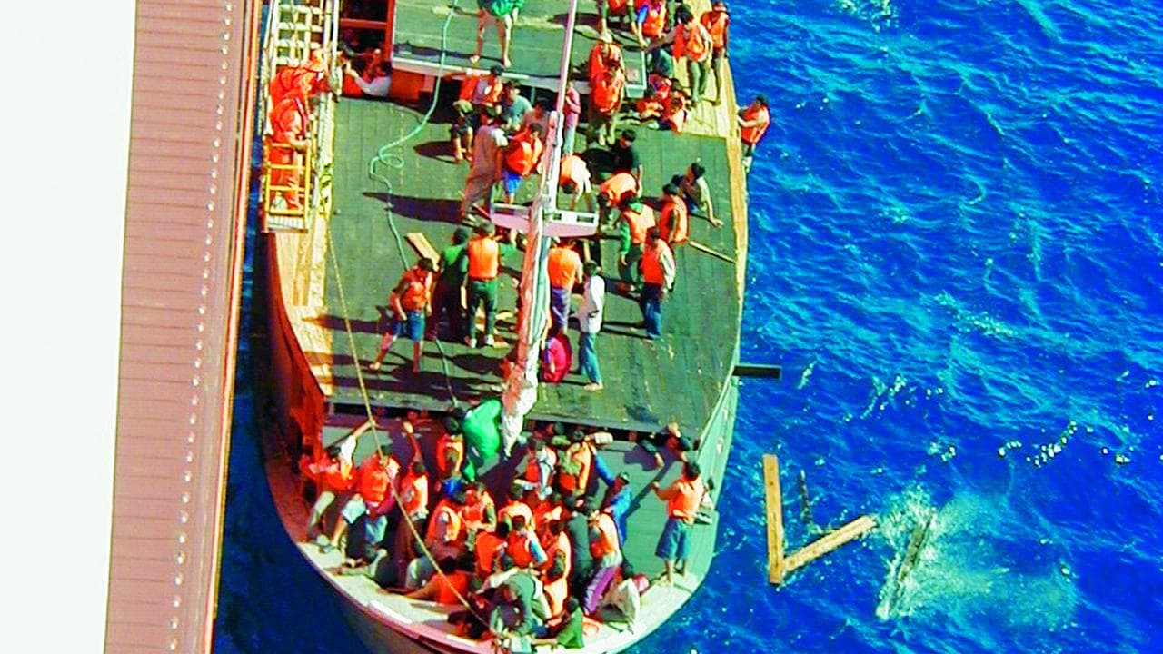 Palapa 1 and the MV Tampa (file)