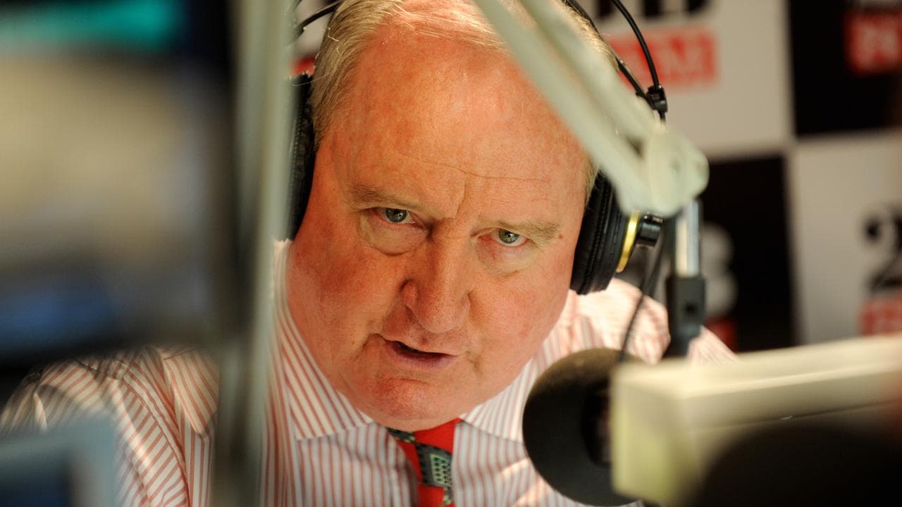 Alan Jones at the microphone