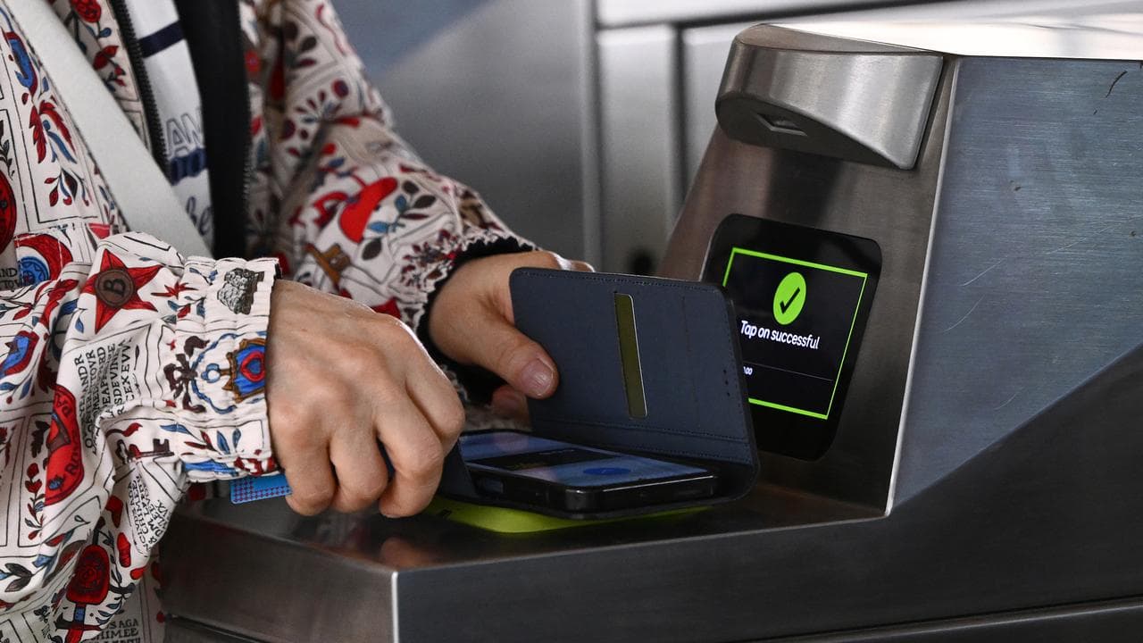 A commuter uses tap and go technology