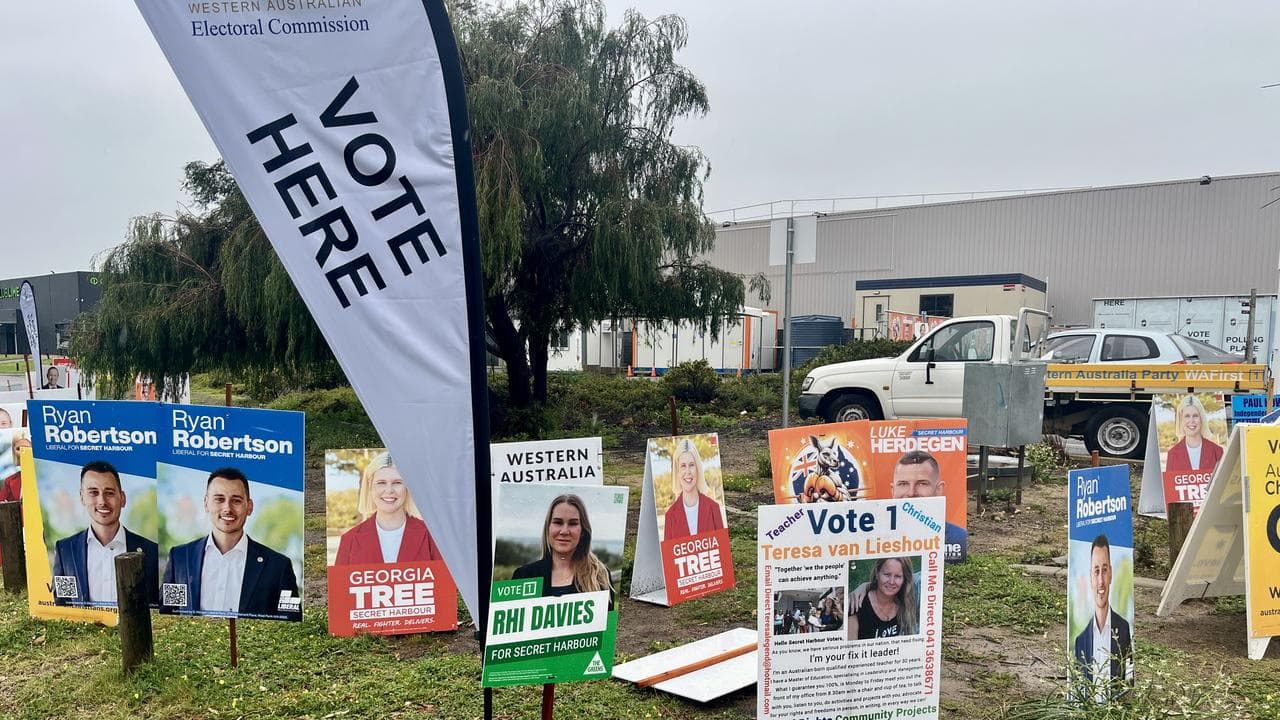 Candidate placards for the Secret Harbour by-election.