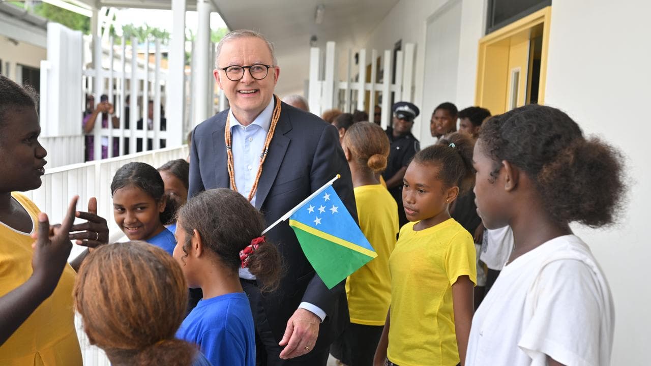 Anthony Albanese with children in Honiara