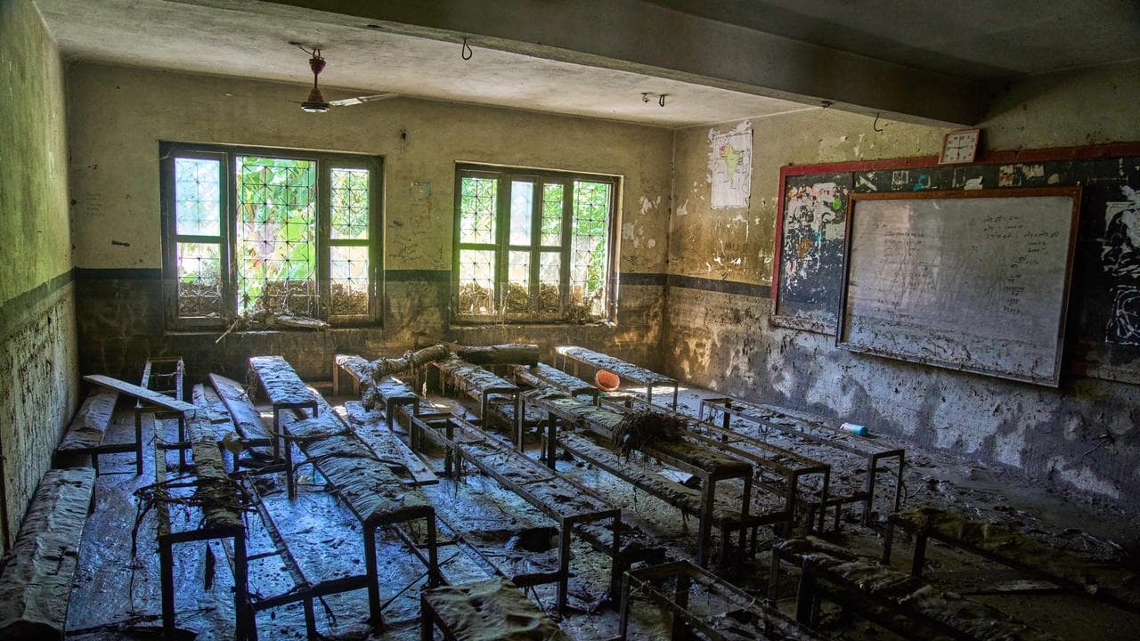 Mud covers a classroom in Nepal