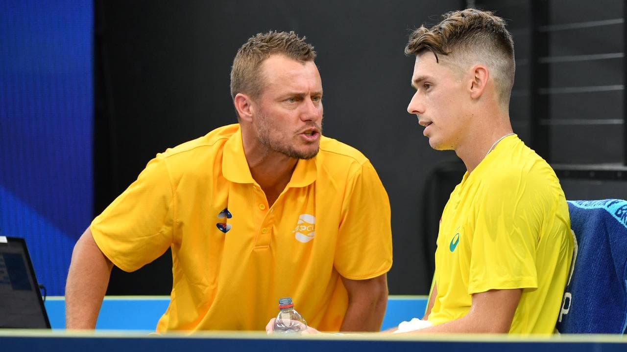 (L-R) Lleyton Hewitt and Alex de Minaur.