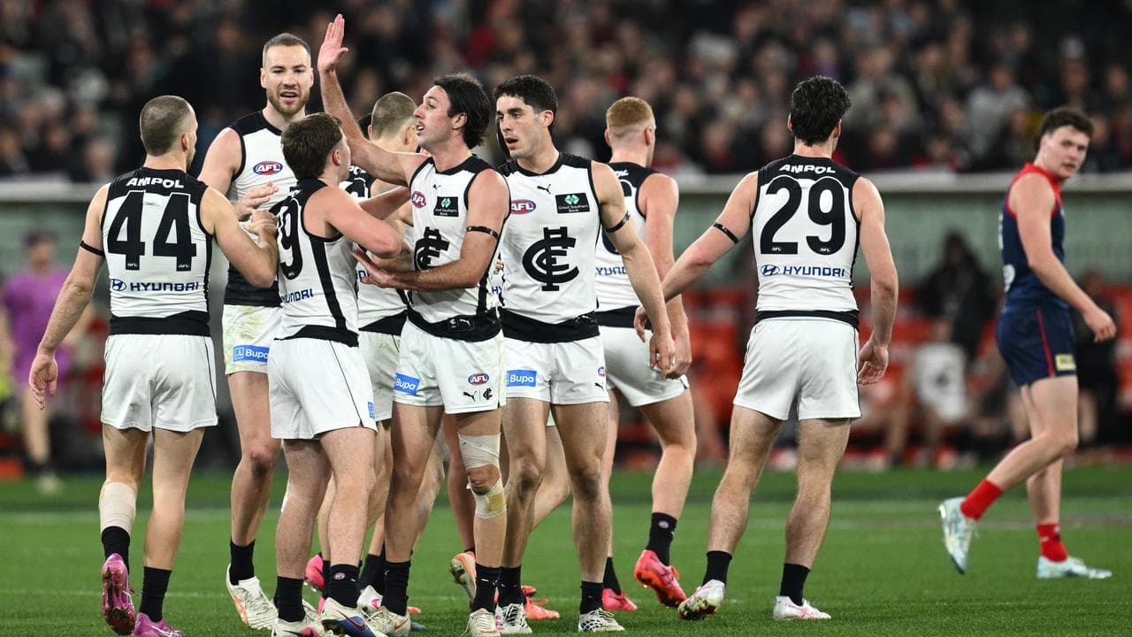 Celebrating Carlton players.