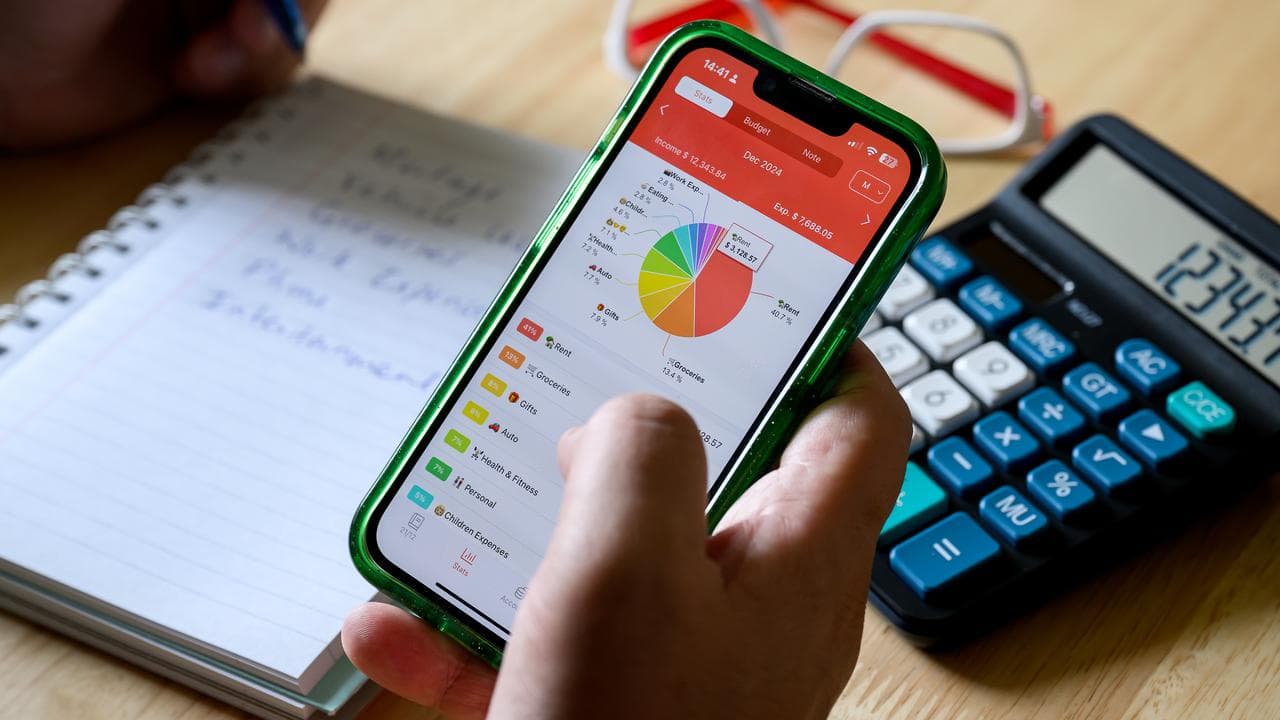 A person using a household budget app (file image)