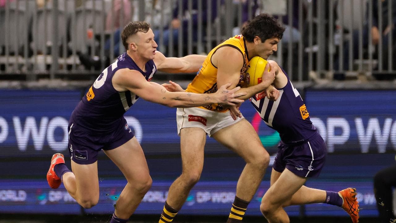 Josh Treacy gave Tom Barrass some close attention