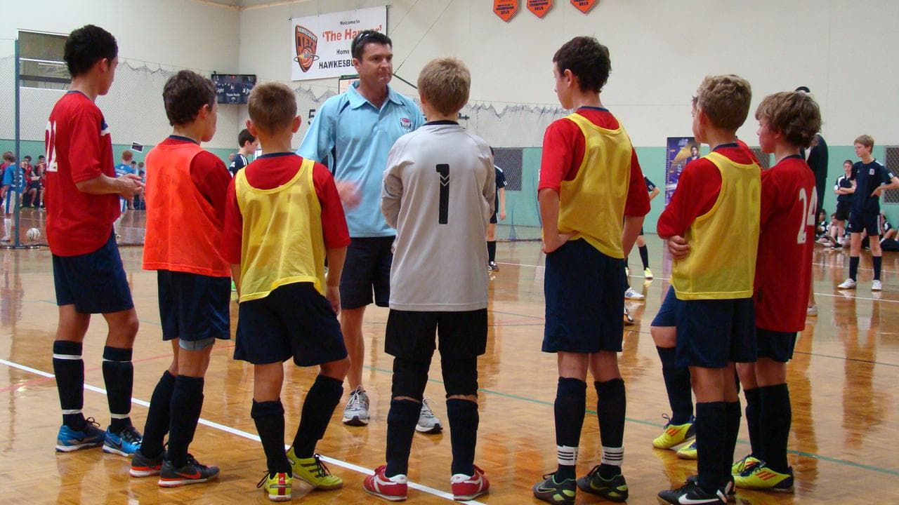 Australian Sports Father of the Year Scott Mutton (centre)