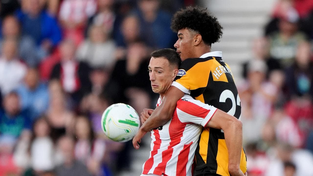 Lucas Herrington (right) in action for Hull against Stoke