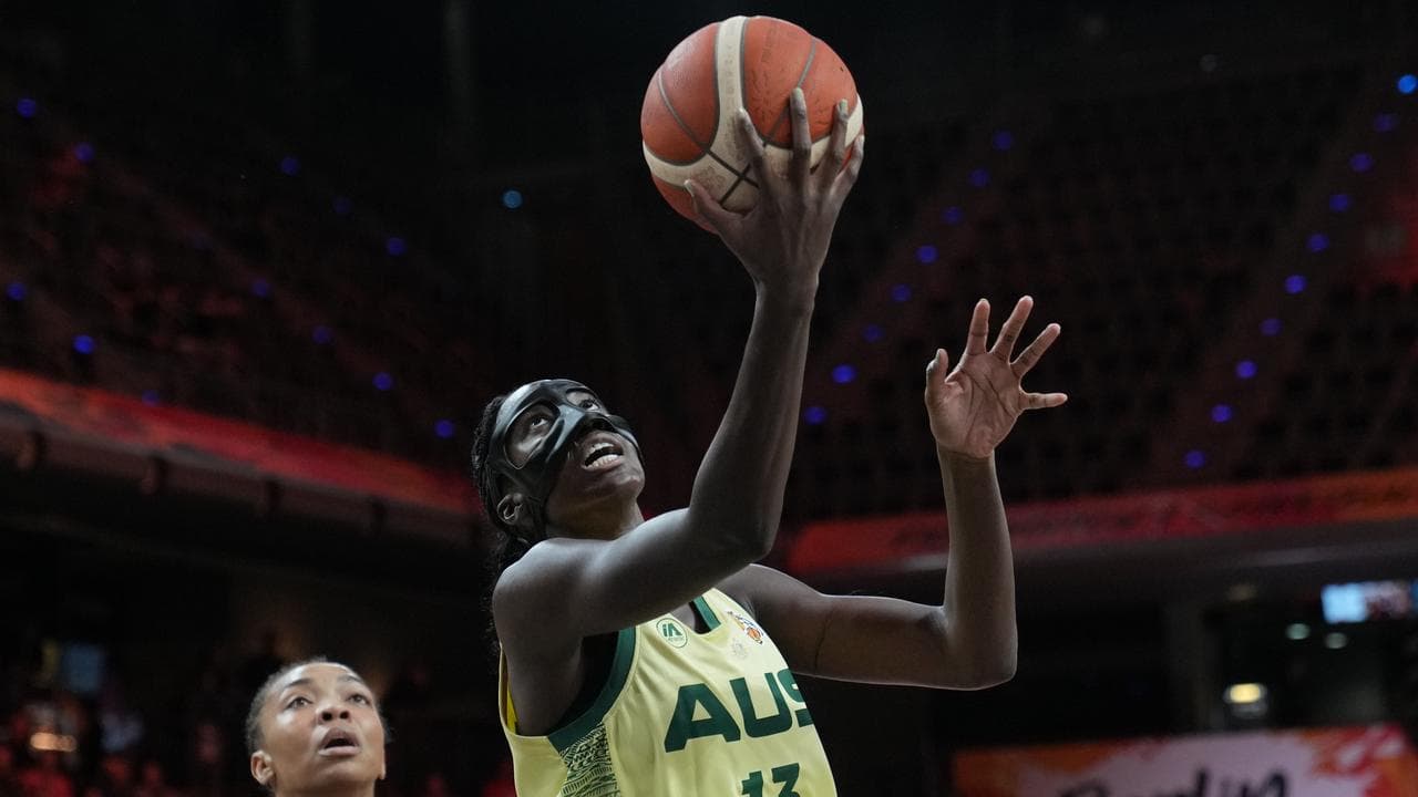 Australia's Ezi Magbegor lays up