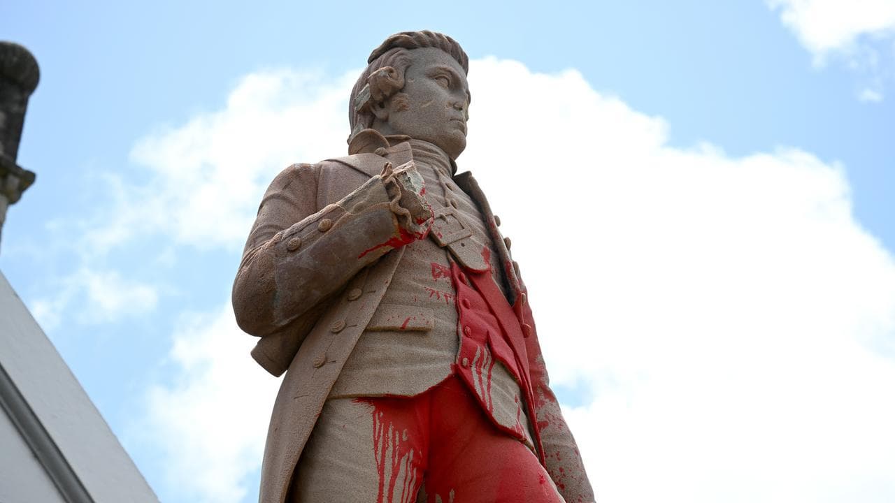 A vandalised statue of Captain James Cook 