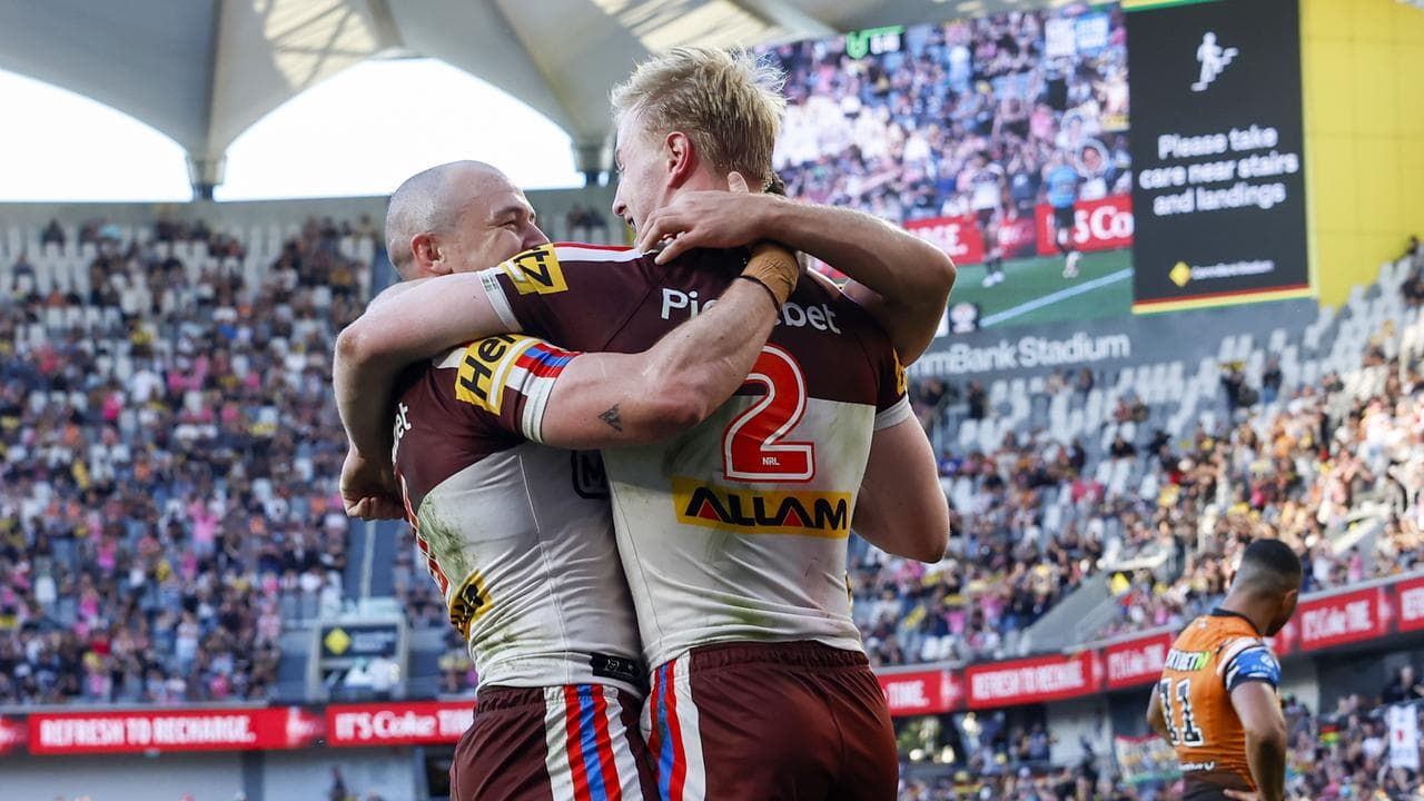 Dylan Edwards is congratulated by Thomas Jenkins.