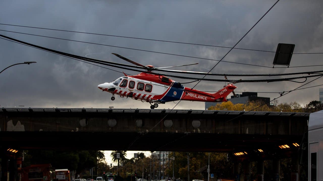 An ambulance helicopter lands at the Alfred Hospital