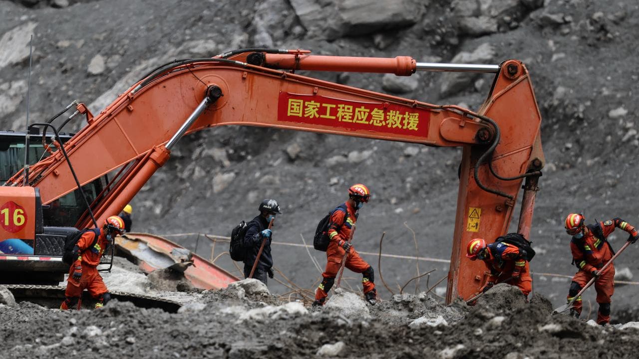 Rescue workers conduct search and rescue operations in Tibet