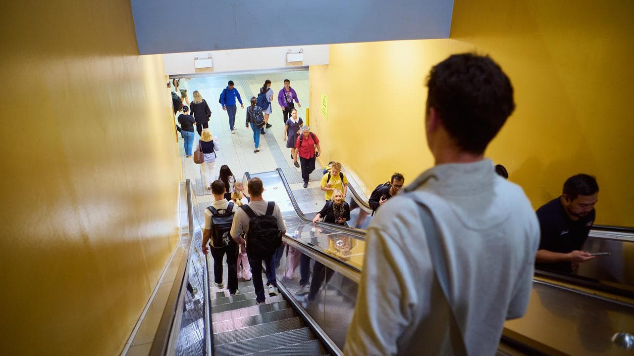 People use the escalators at Bondi Junction railway station