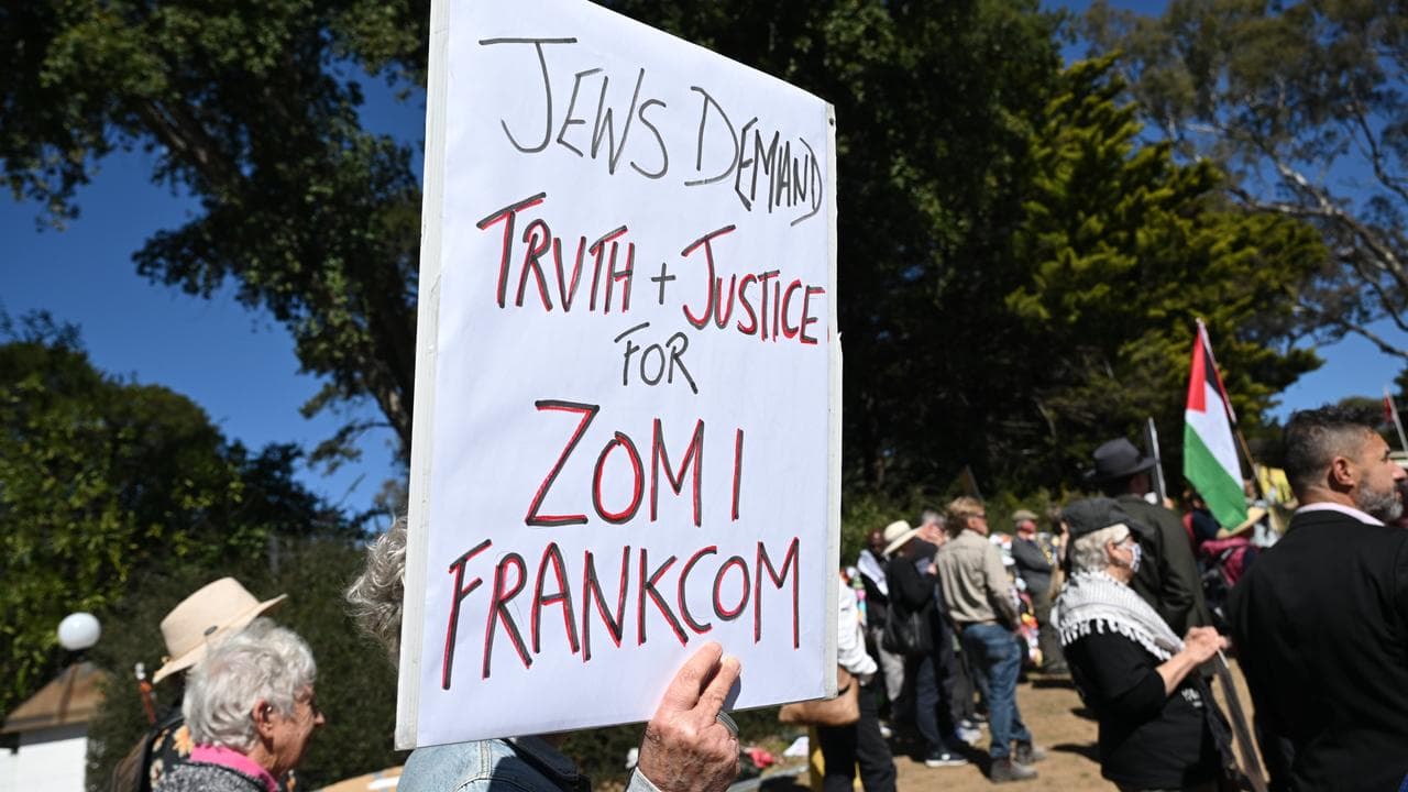 Protesters at a rally for Zomi Frankcom