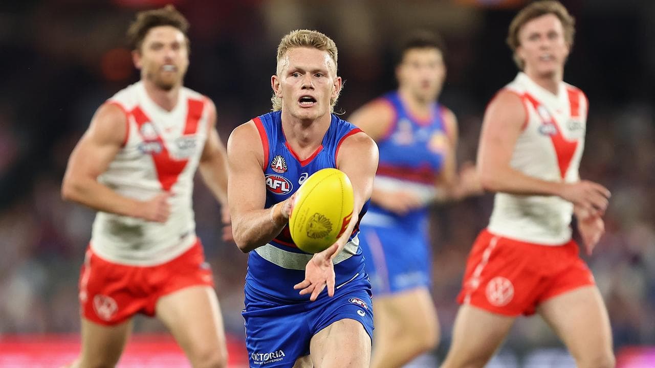 Adam Treloar.