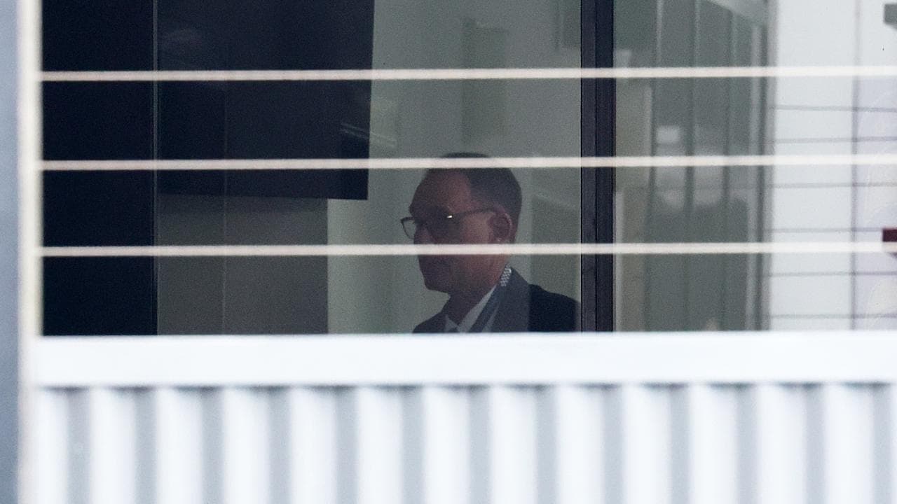 Police inside the CFMEU head office in Brisbane