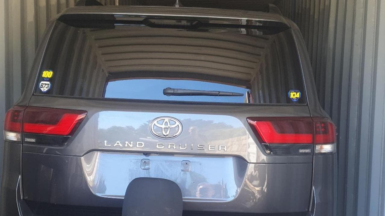A car in a shipping container