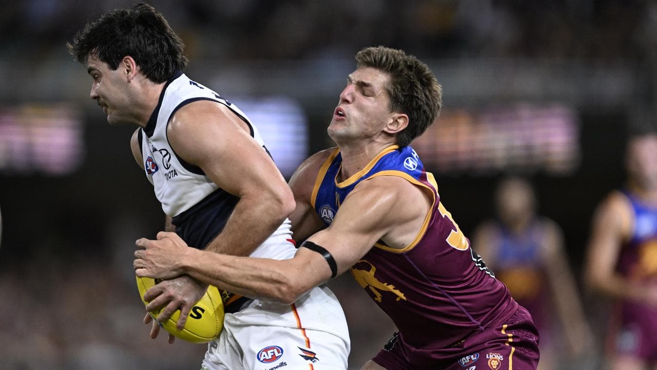 Zac Bailey was hot on the tail of Adelaide forward Darcy Fogarty.