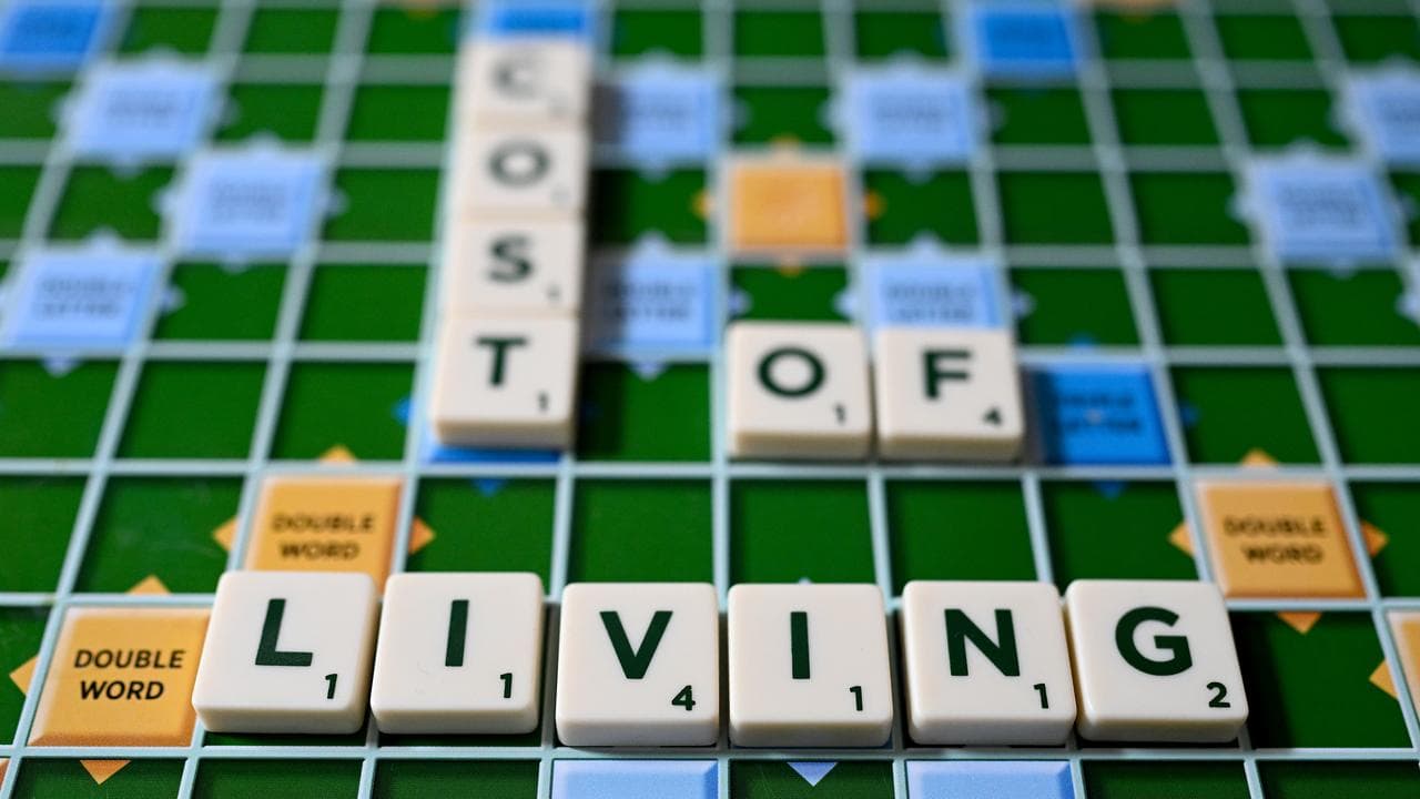 The words ‘Cost of Living’ on a Scrabble board (file image)