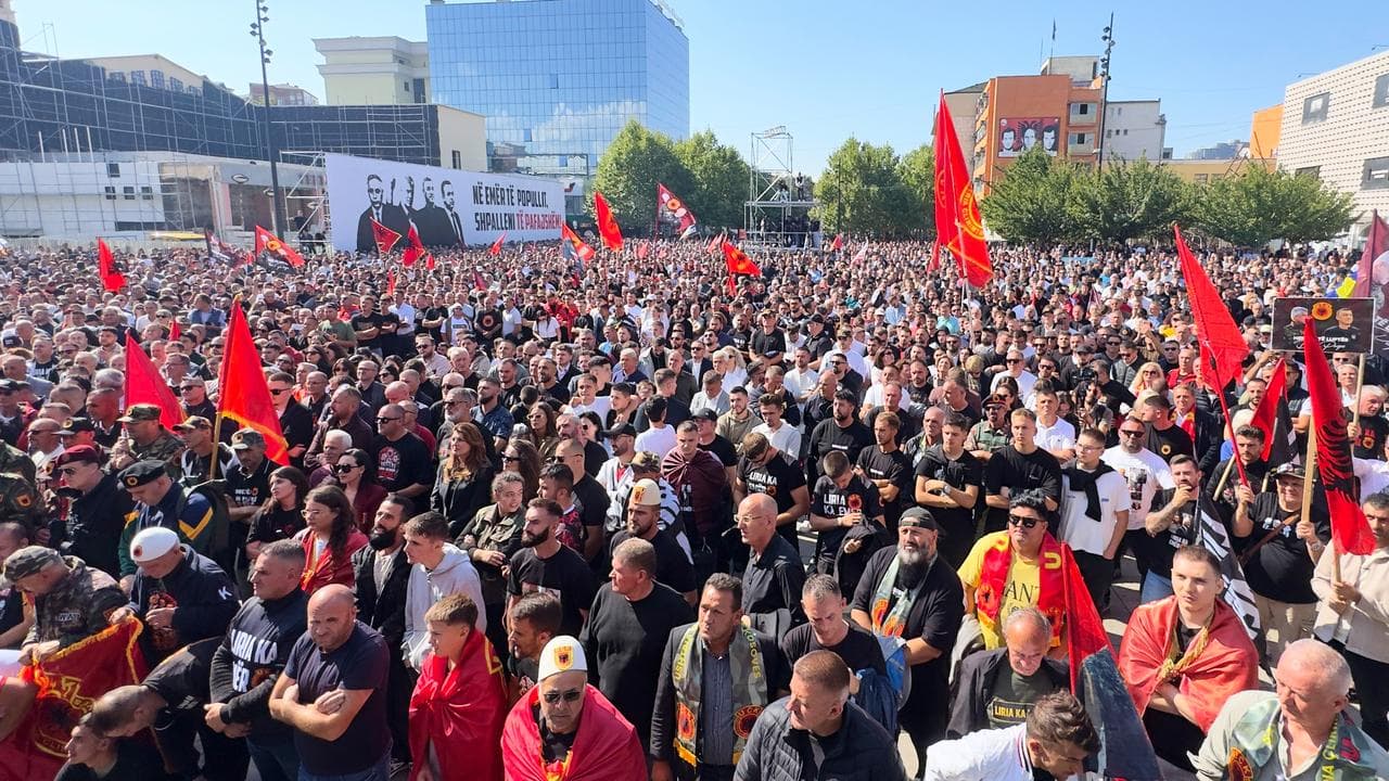 People gather in Pristina to watch the verdict for Hashim Thaci 