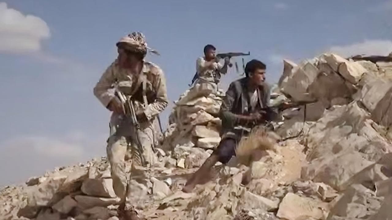 Houthi fighters battling Saudi-backed forces in eastern Jawf, Yemen