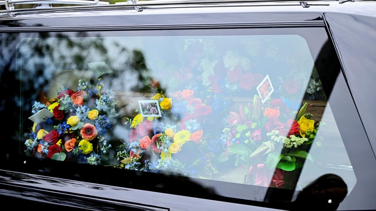 floral arrangements in hearse