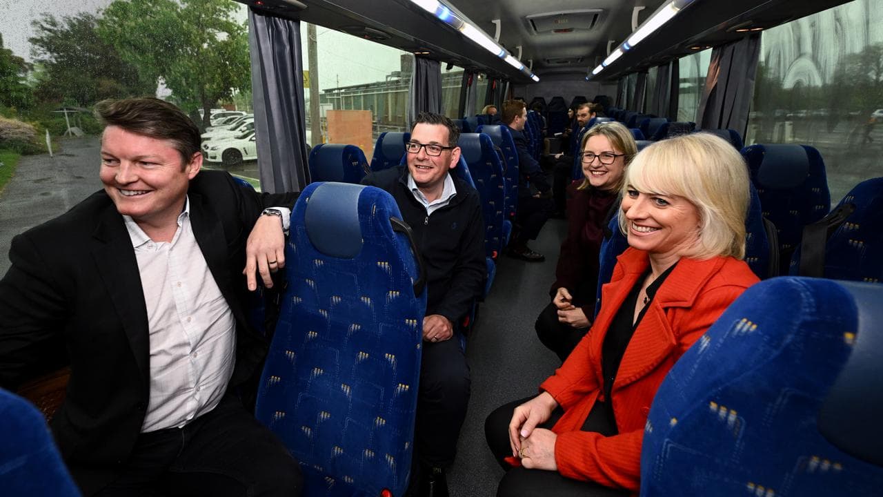 Ben Carroll and politicians on a bus 