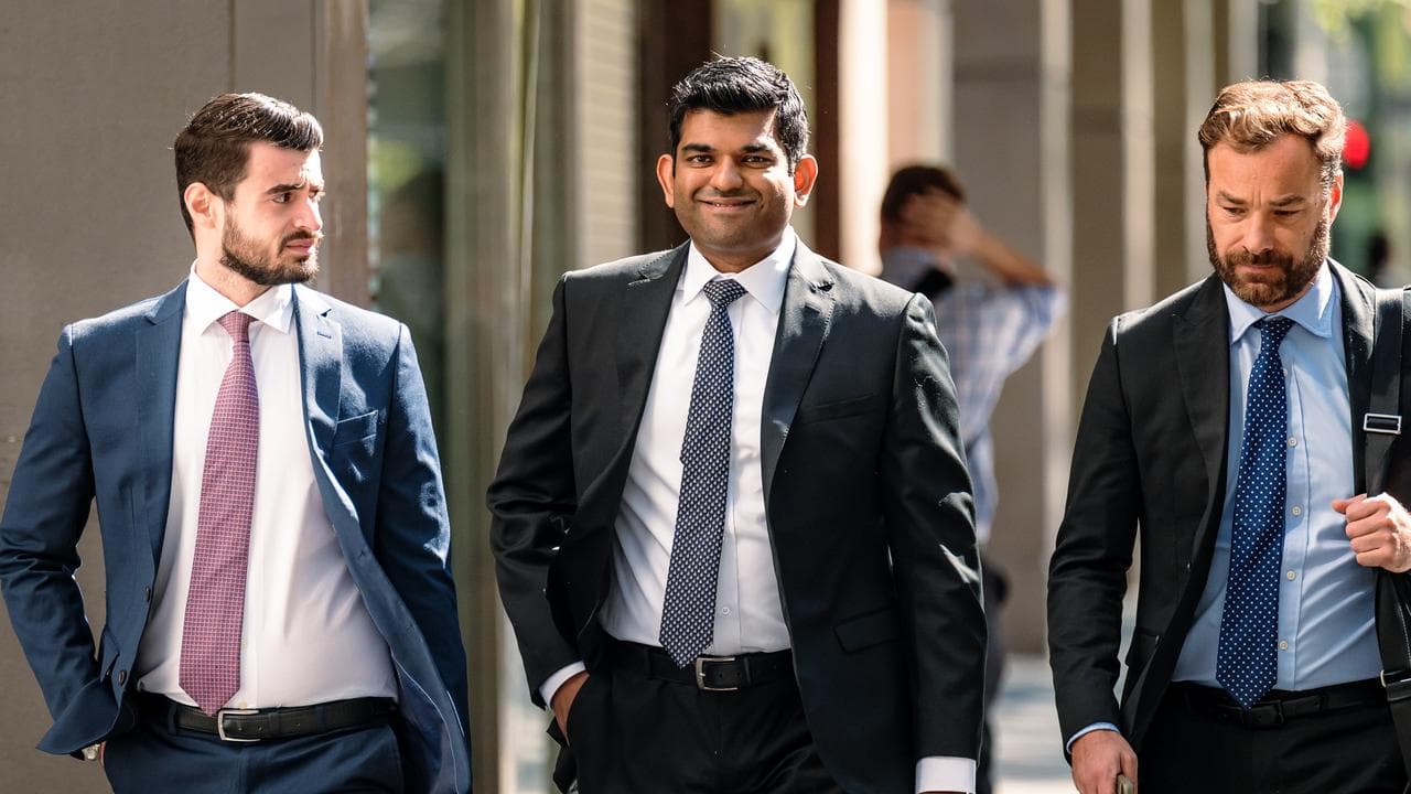 Former Strathfield councillor Sharangan Maheswaran (centre)