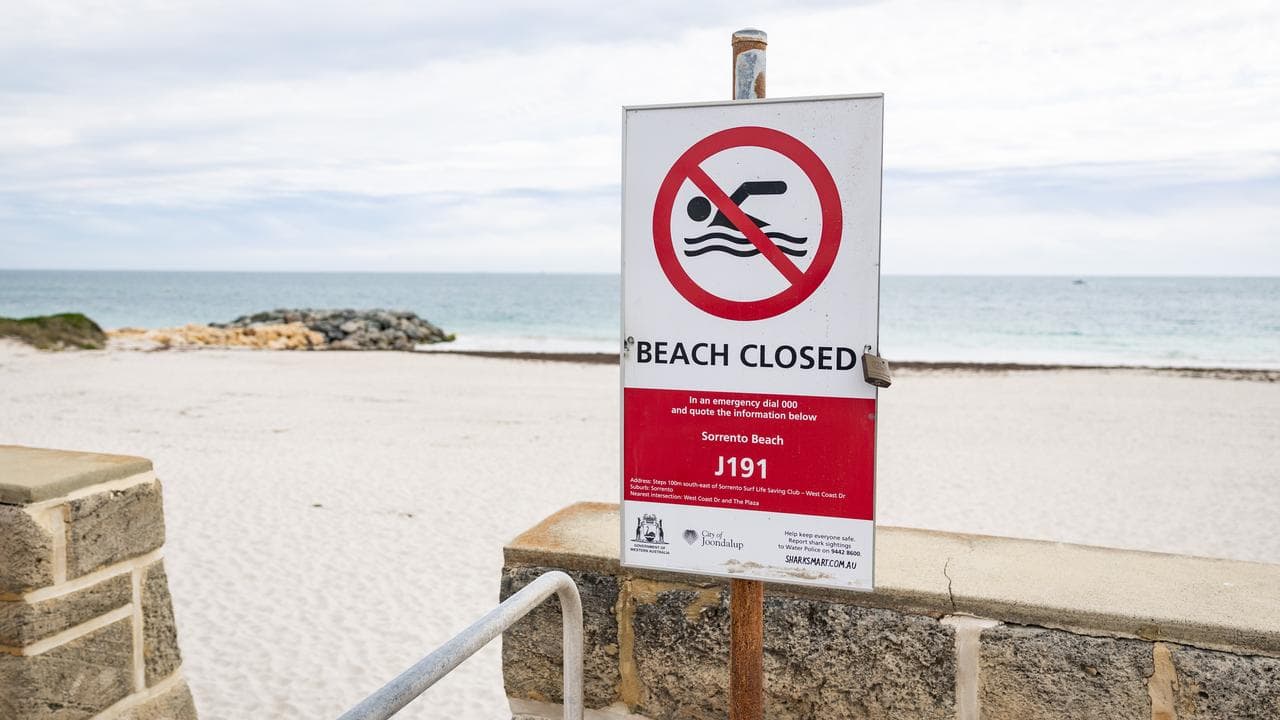 Beach closed sign