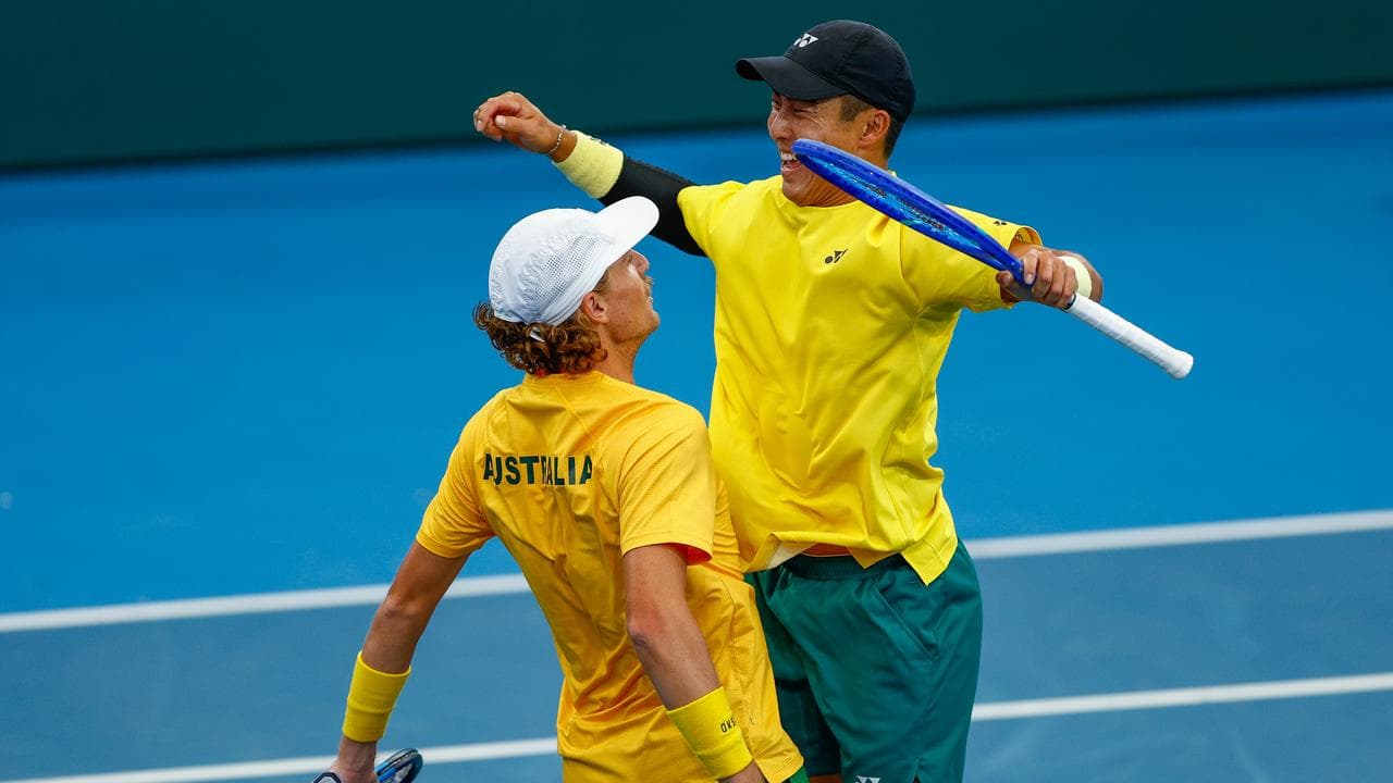 Max Purcell and Rinky Hijikata celebrate their doubles victory.