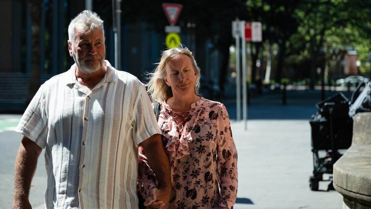 man and woman walking