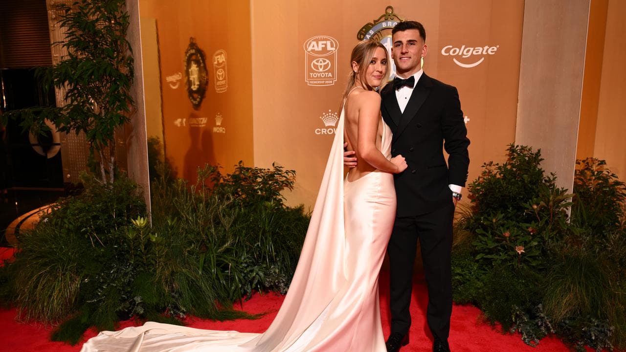 Collingwood’s Nick Daicos and partner Arlette Amor
