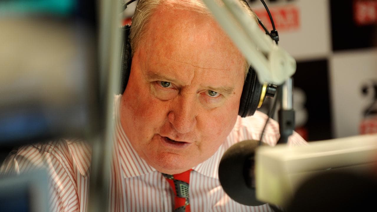 Alan Jones behind mic