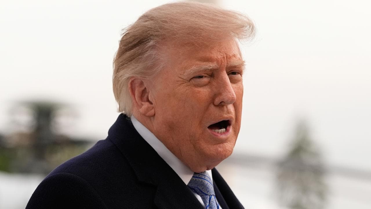 US President Donald Trump speaks to reporters at the White House