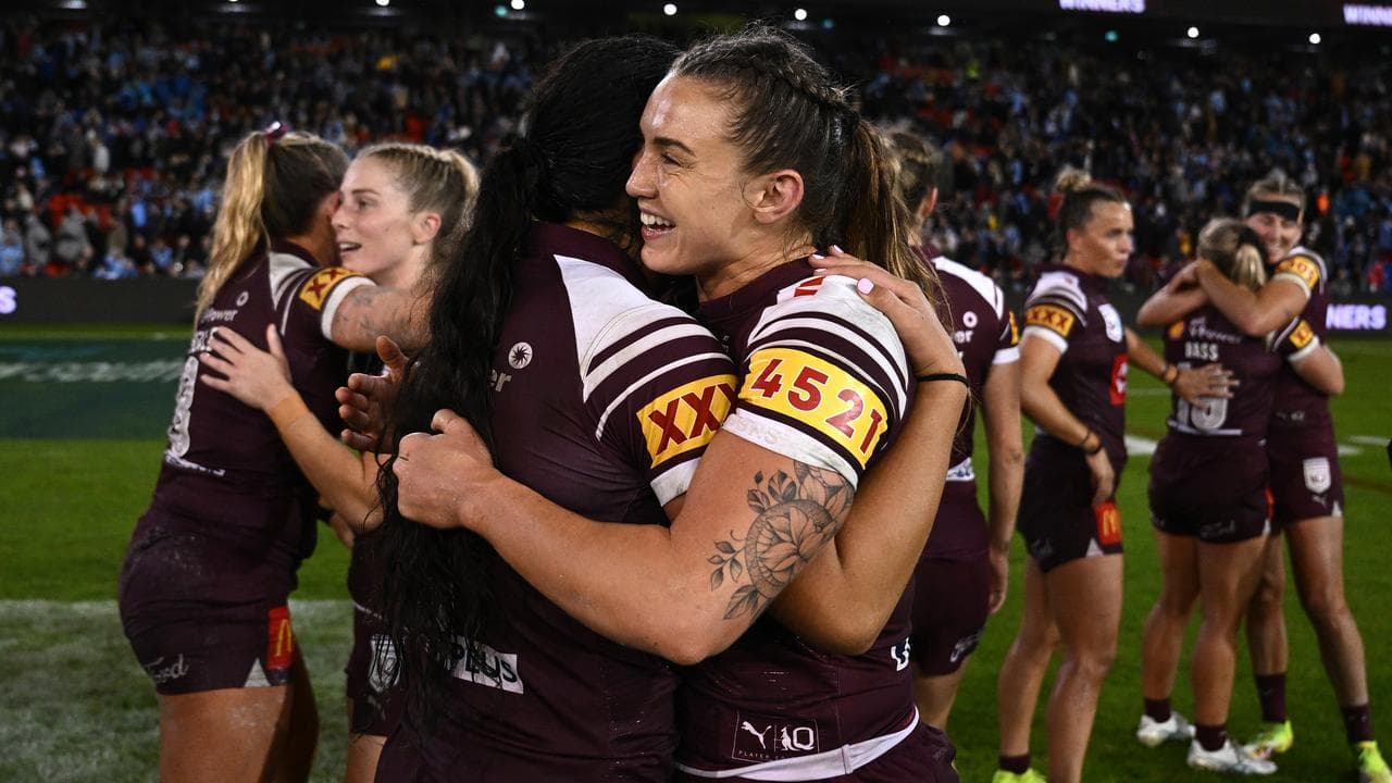 Sienna Lofipo and Julia Robinson embrace .