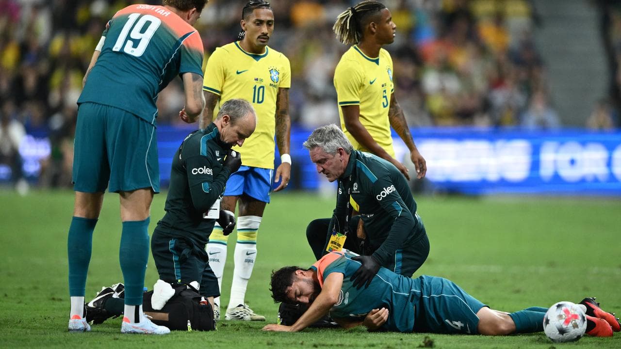 Jacob Italiano of Australia receives treatment