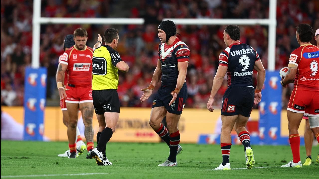 Roosters' Victor Radley (centre).