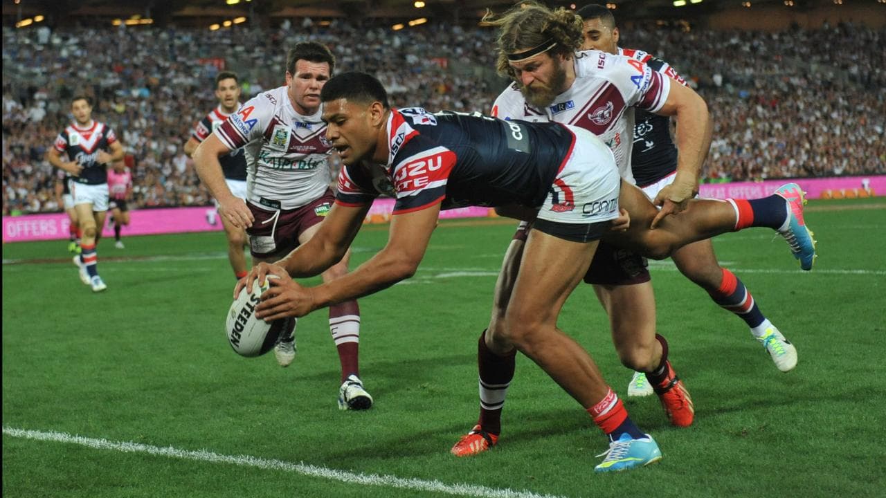 Roosters' Daniel Tupou (centre)
