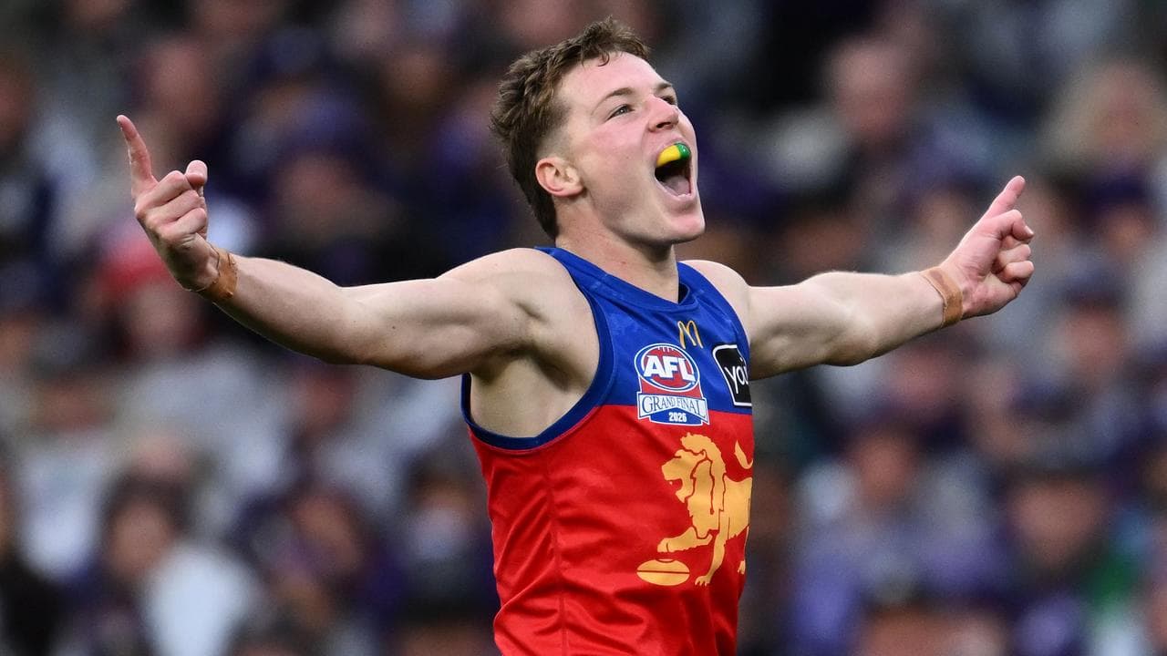 Logan Morris of the Lions celebrates 