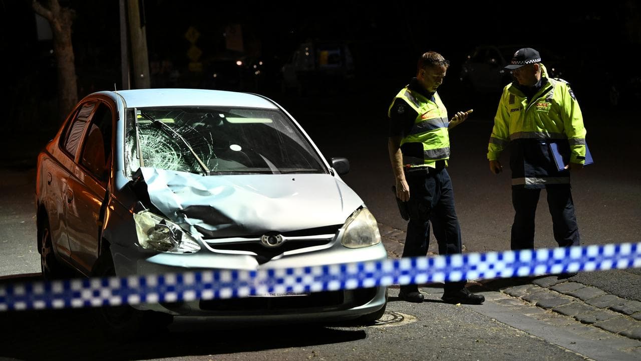 police near smashed car