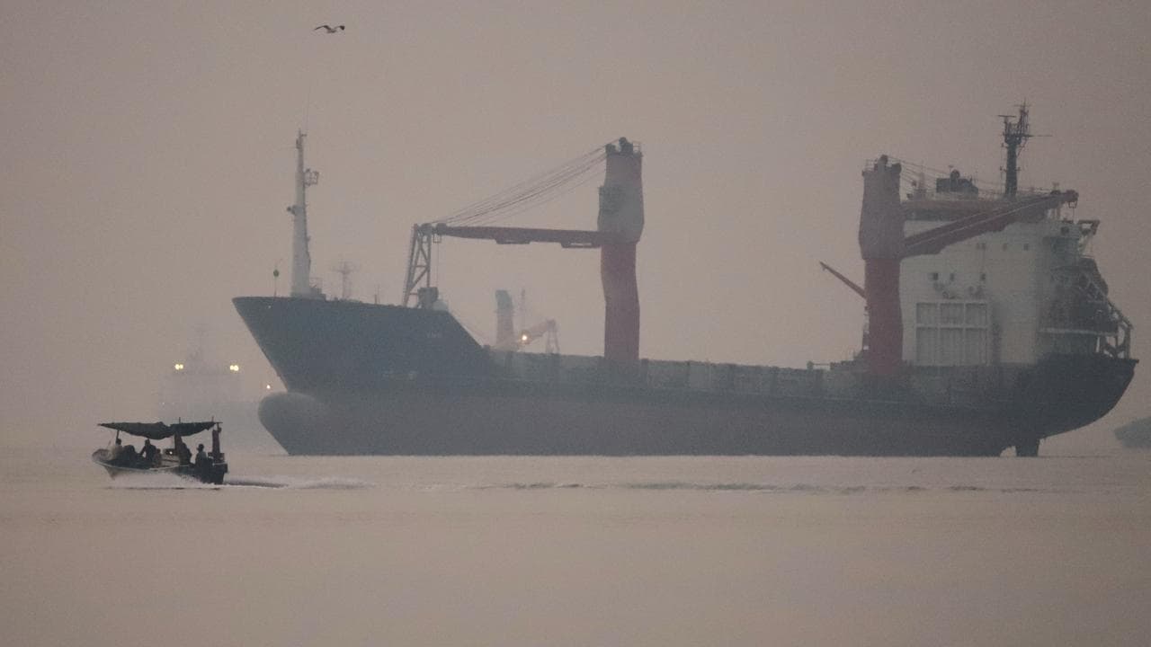 An anchored cargo ship in the Strait of Hormuz