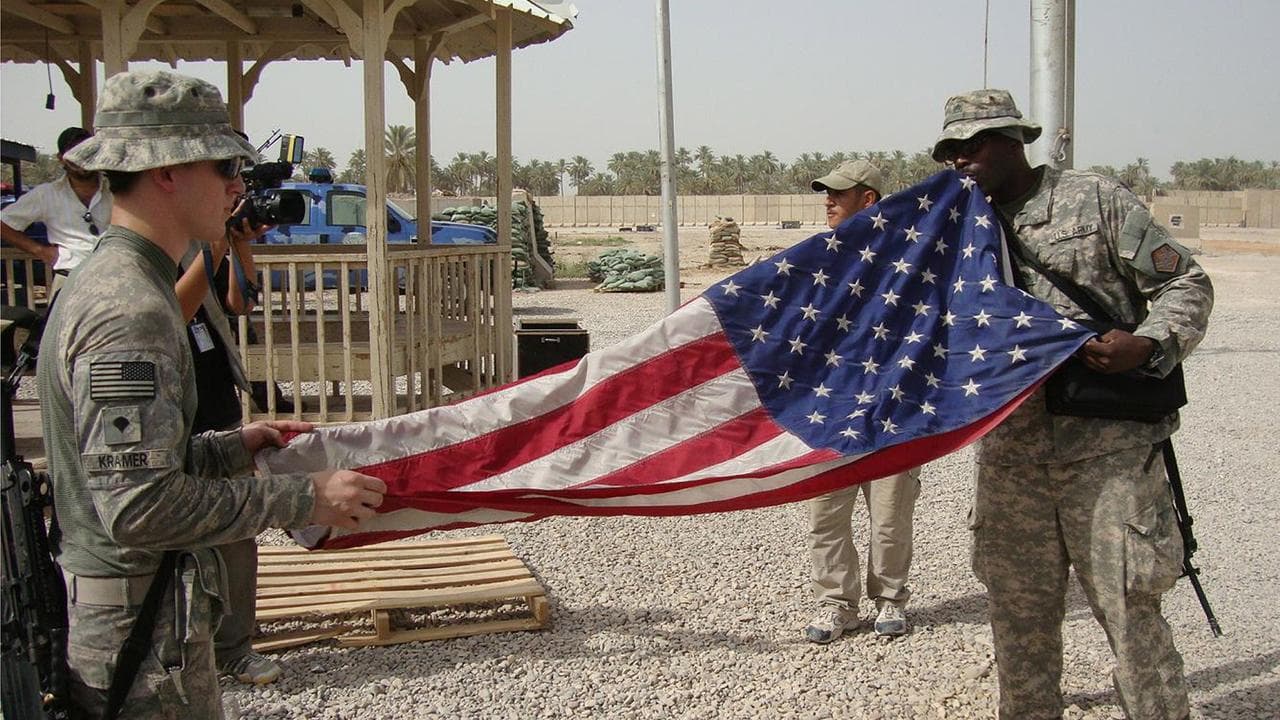 US soldiers fold their national flag south of Baghdad in 2010