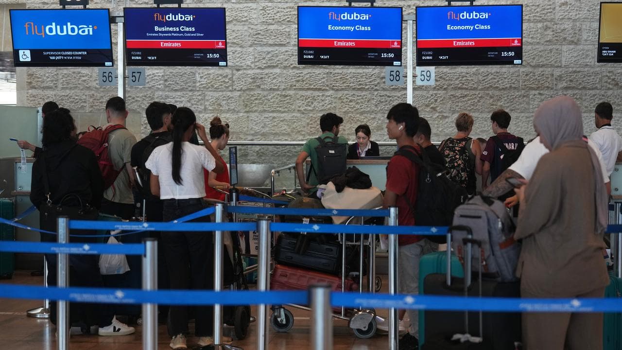 FlyDubai passengers check in at Ben Gurion International Airport