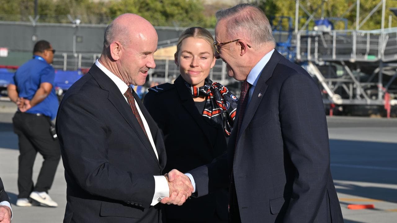 Anthony Albanese being greeted by Greg Moriarty at San Jose Airport.