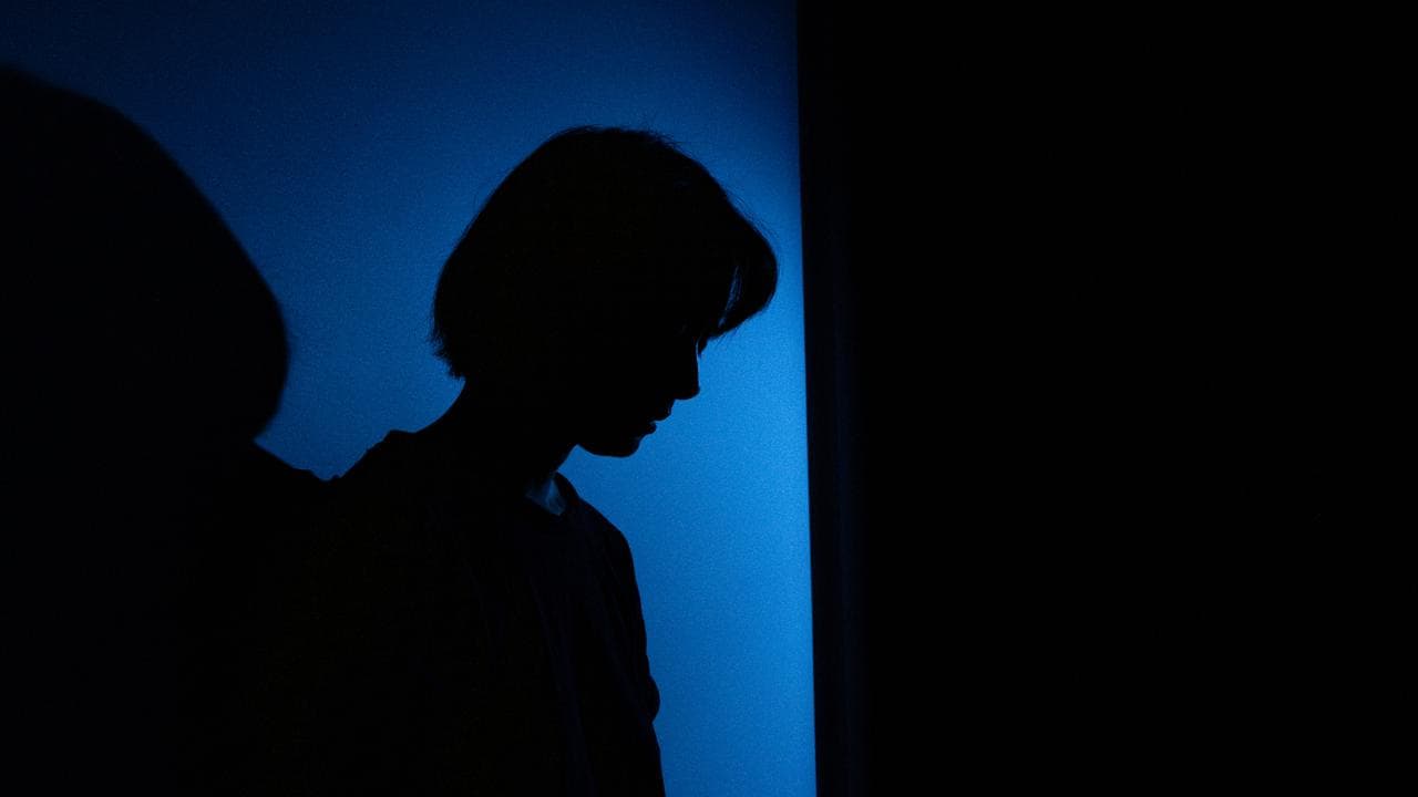 A person poses for a photograph (file image)