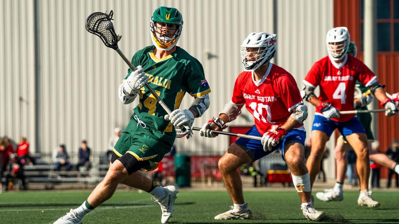 Lachlan Walker playing lacrosse