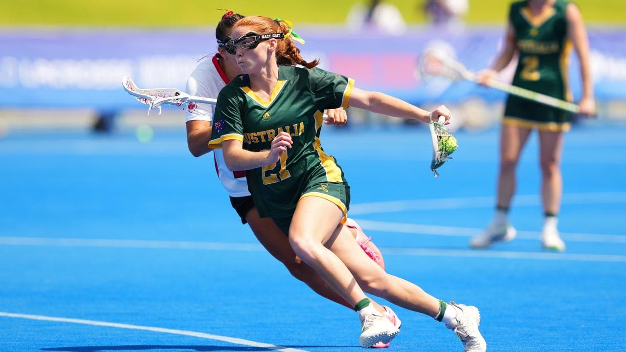 Mim Suares-Jury playing lacrosse